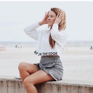 Divided Stay on The Edge White Cropped Sweatshirt